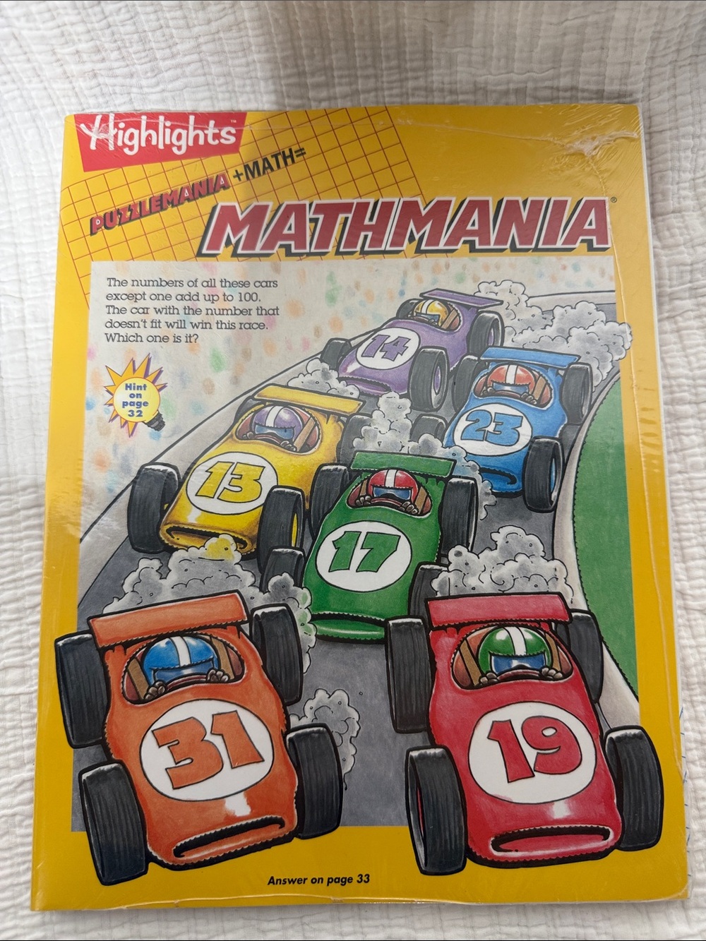 Highlights Mathmania Puzzle Book - Yellow Cover with Colorful Racecars